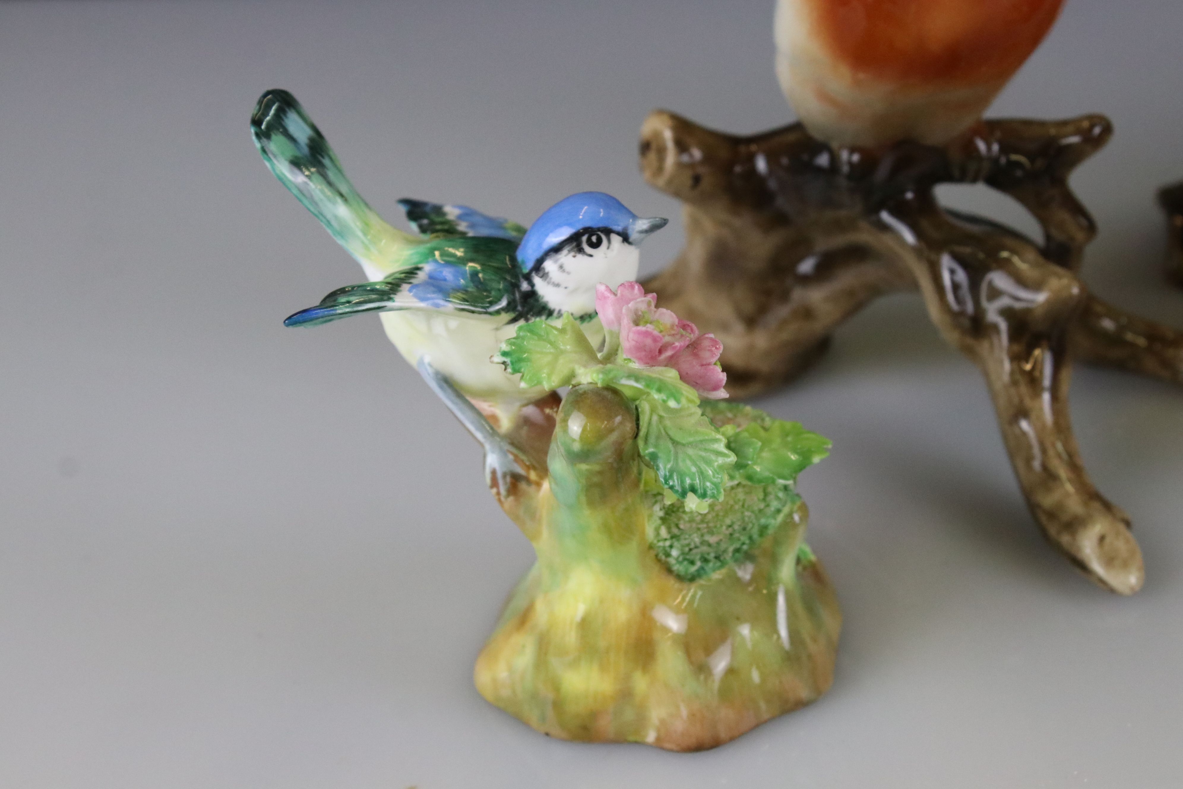 Seven porcelain bird ornaments to include a Beswick 2308 Song Thrush, Goebel Chaffinch, Raybur - Image 2 of 6