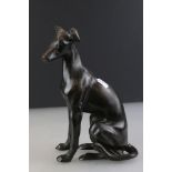A cast bronze figure of a whippet, stands approx 24cm in height.