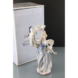 Lladro boxed 6570 ' New Horizons ' Millennium 1999 figure, depicting a young woman with a pair of