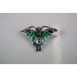 A silver & Plique a jour bug brooch.