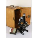 A British Military World War Two Issued Microscope complete with lenses, slides..etc. Dated July
