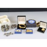 A collection of antique and vintage costume jewellery to include white metal and enamel bangle,