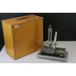 A Griffin & George Ltd microscope complete with lenses and fitted wooden case.