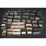 Around 44 OO gauge kit built items of rolling stock to include wagons, vans and coaches, mainly a