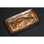Copper pin dish with fish decoration in the style of Newlyn