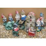 Large collection of stone gnomes etc