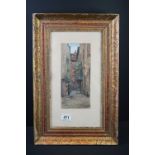 * Penlab?, a signed watercolour of a continental passageway with woman in window, dated in margin