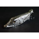 Silver plated document holder in the form of a fish with glass eyes