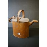 Antique metal aesthetic watering can