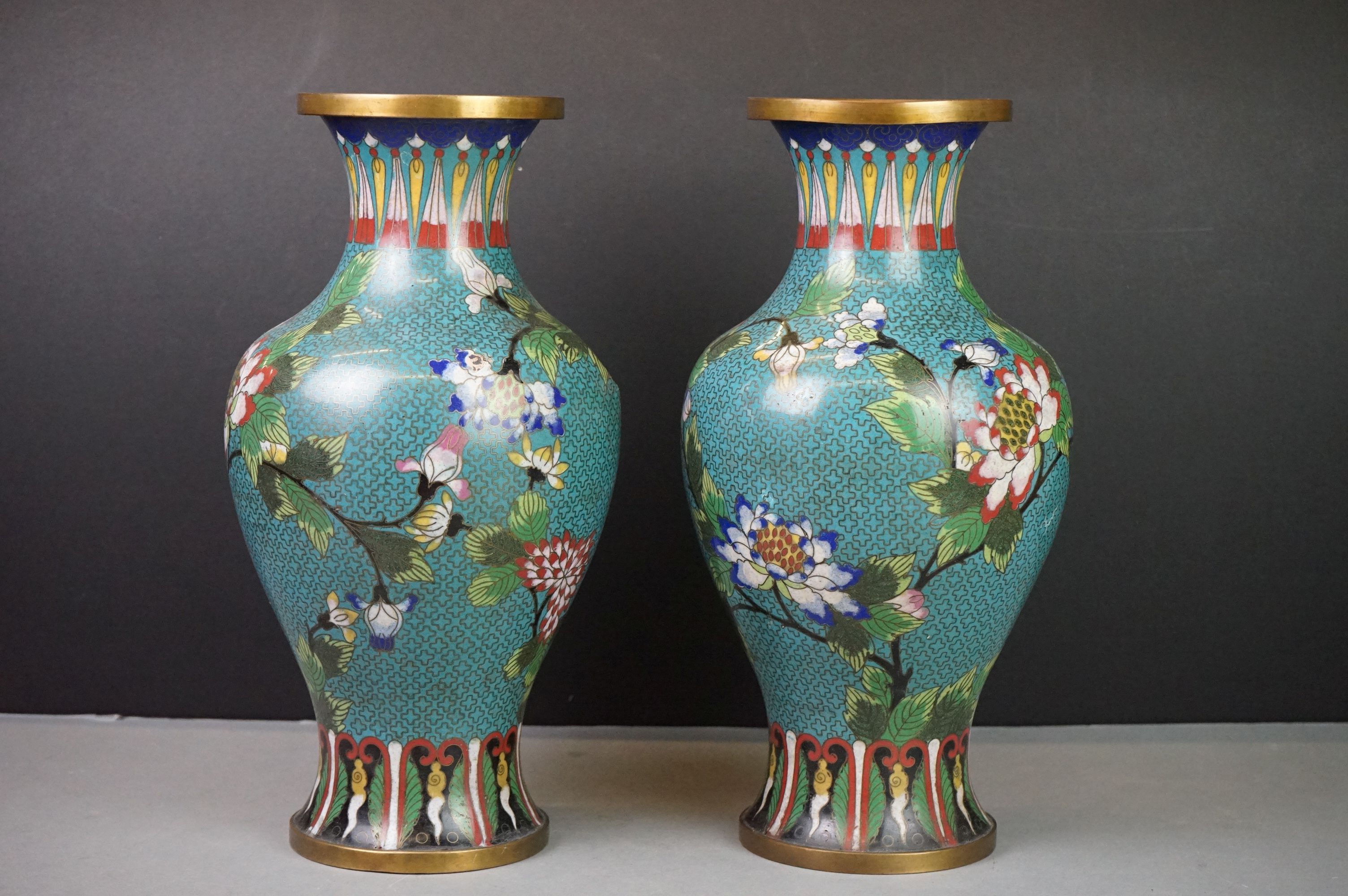 Pair of Chinese Cloisonne Vases decorated with flowers on a turquoise ground, 32cm high