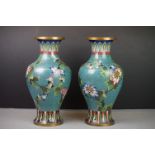 Pair of Chinese Cloisonne Vases decorated with flowers on a turquoise ground, 32cm high