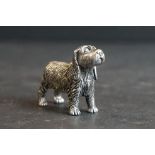 Well cast silver figure of a spaniel dog