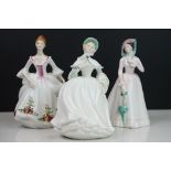 Three Royal Doulton porcelain lady figures to include HN 3221 Country Rose, HN 2706 Julia and HN