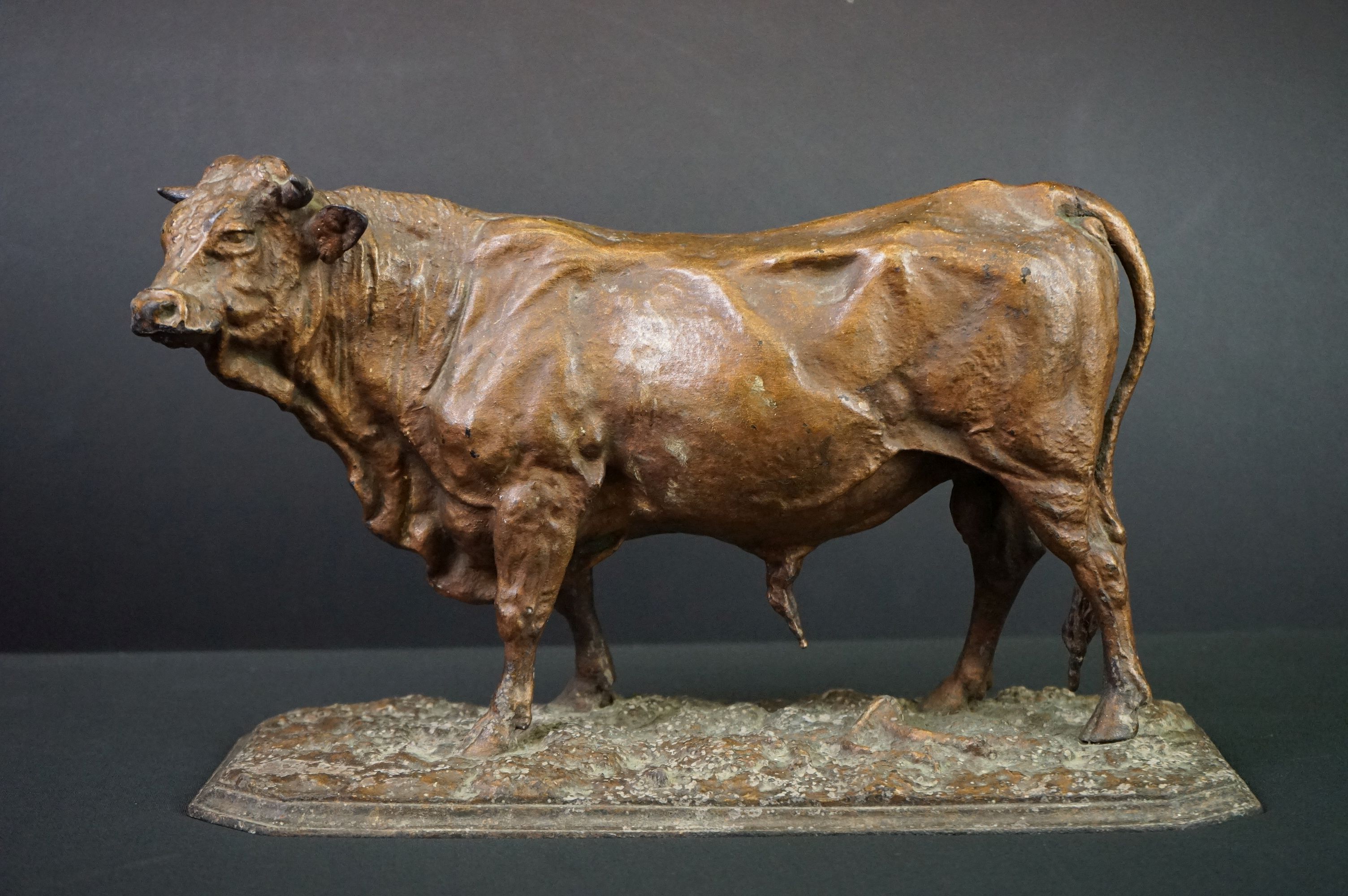 A large spelter ornamental figure of a bull. Mene to plinth