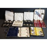 A collection of six sets of hallmarked sterling silver and silver plated spoon sets & a pair of