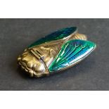 Brass cased bug vesta with enamel wings