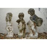 Collection of three reconstituted stone garden figural ornaments of classical form