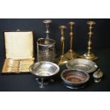 A small collection of mixed metal ware to include brass candlesticks, silver plated bottle
