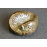 Small bronze paperweight in the form of two intertwined fish, probably carp, diameter approx. 4cm