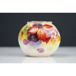 Royal Worcester vase of squat form decorated with Berries and Leaves signed K Blake. 7cm tall