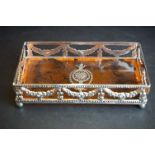 Silver plated galleried tray with tortoiseshell style base on bun feet