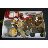 A small group of mixed collectables to include King George III coins, medallions and a coin holder.