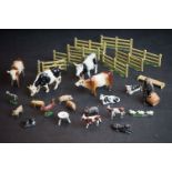 A small collection of Britains lead farm animals and accessories.