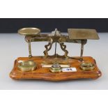 Set of Victorian Brass Postal Scales with Six Weights on a Wooden Plinth Base, 25cm long