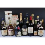 A mixed collection of bottled alcohol to include Heidsieck & Co Monopole Blue Top Champagne, Pimm'