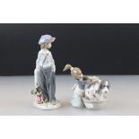 Two Lladro Models including Boy with Knapsack, 21cm high and ' Bashful Bather ' model 5455