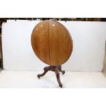 Victorian Mahogany Circular Tilt Top Table raised on a bulbous support with three splayed legs and