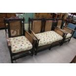 Early 20th century Carved Oak Bergere Three Piece Suite comprising two seater settee, 121cm long x