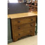 A pine chest of two long and two short drawers.