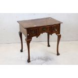 George I Walnut Lowboy with three drawers, shaped apron and raised on four cabriole legs with square