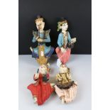 A set of four carved wooden wall plaques in the form of asian musicians