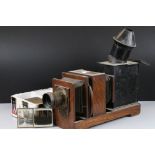 Victorian Oak Magic Lantern together with over 90 Magic Lantern Slides including approximately 47