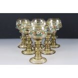Set of six Bohemian green ground hock glasses with enamelled floral decoration and roundels