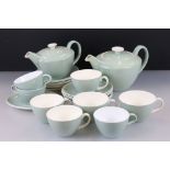 Poole Pottery Cameo Celadon part Tea Service comprising two teapots, eight cups, eleven saucers