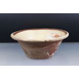 19th century Terracotta Dairy Bowl with ochre slip glazed interior, 35cm diameter