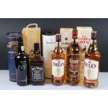 A collection of bottled whisky to include Jack Daniels, Bell's, Grant's, Glenburn and Famous