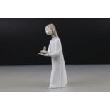 Lladro Figurine of a Girl carrying a chamber stick, 21cm high