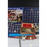 A small collection of commemorative coins and medallions together with a small group of watches to