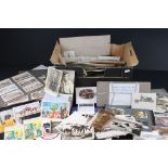 A box of mixed ephemera to include photographs, postcards, football programme, stamps ...etc..
