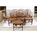 Set of Eight Sheraton Country Fruitwood Dining Chairs, including two carvers, all with solid seats