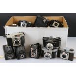 A large collection of cameras to include Kodak, Ensign and Coronet examples.