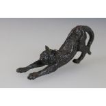 Bronze sculpture of a stretching cat, approx. 6cm long