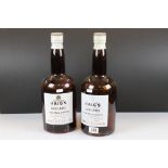 A pair of Haig Whisky gold label shop display bottles, approx 40cm in height.