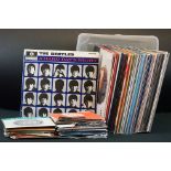Vinyl - Approx 50 LP's and small quantity of 45's spanning genres and decades to include The