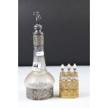 An antique German etched glass Schnapps decanter bottle with hallmarked silver decorative collar and