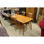 Set of Four Ercol ' Goldsmith' Windsor Pale Elm and Beech Dining Chairs together with an Ercol style